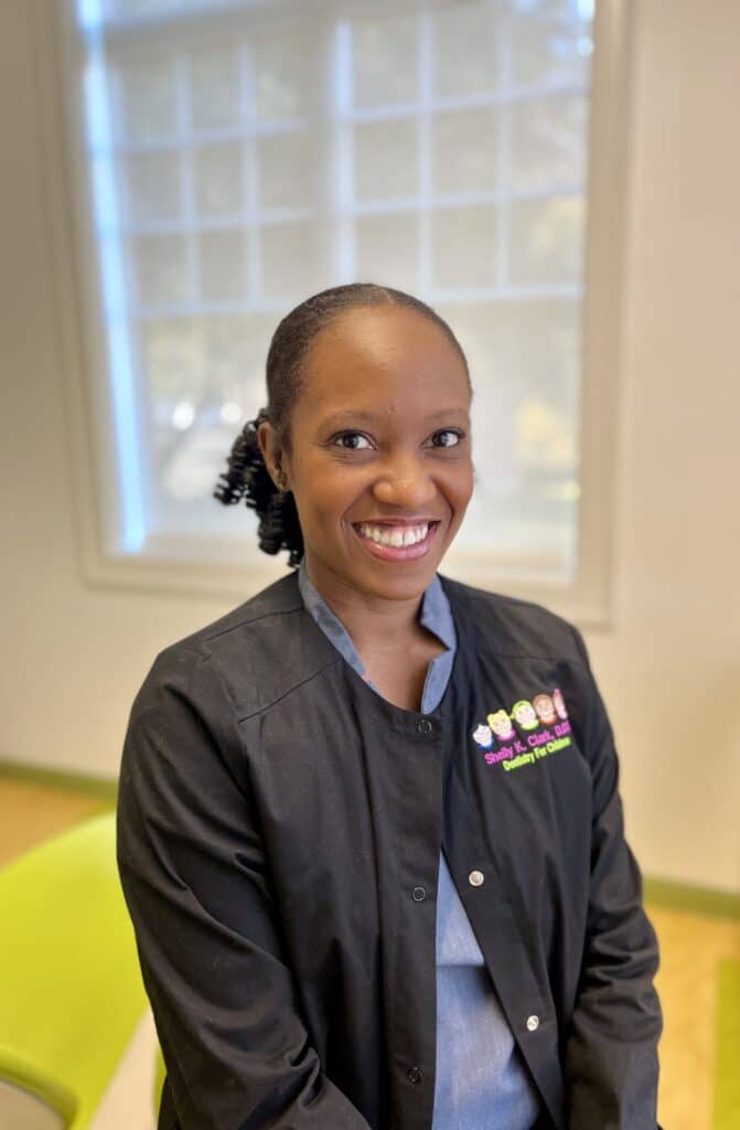 Dr. Tasheka Pritchett smiling in the office